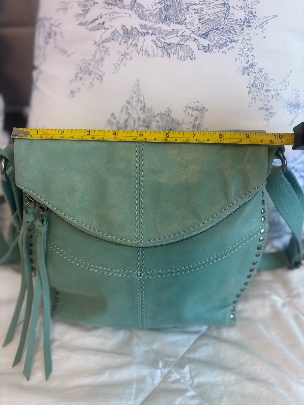 The Sak Mint Green Leather Crossbody with Tassel and Stud Accents